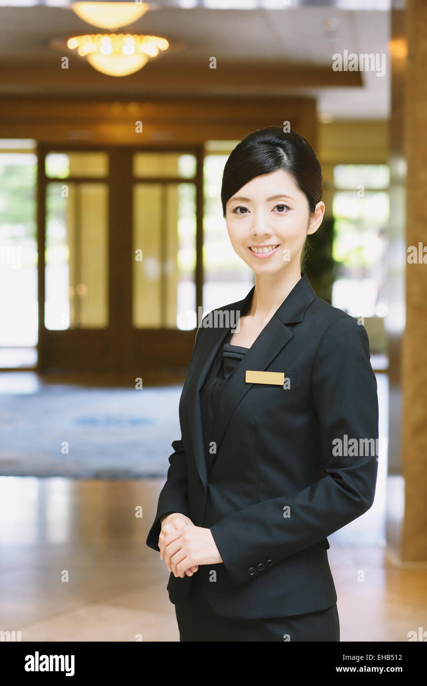 Femmina giapponese hotel concierge Foto Stock
