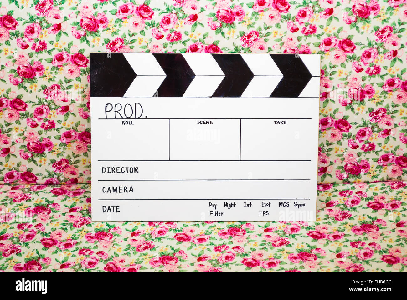 In casa Film di ardesia in background di rose. Foto Stock