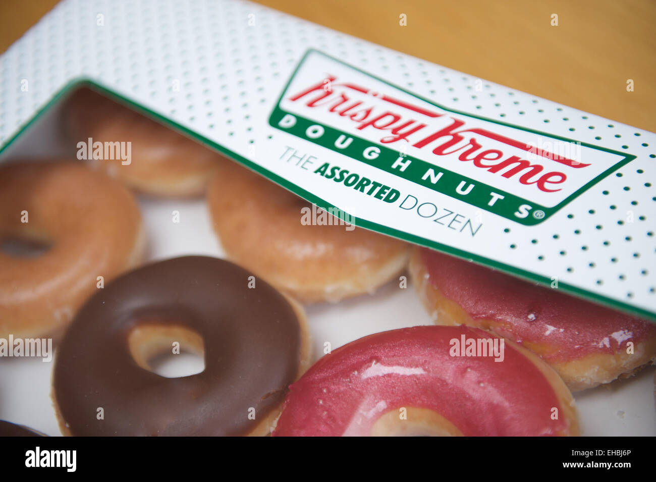 Ciambelle Krispy Kreme casella considera dessert Foto Stock