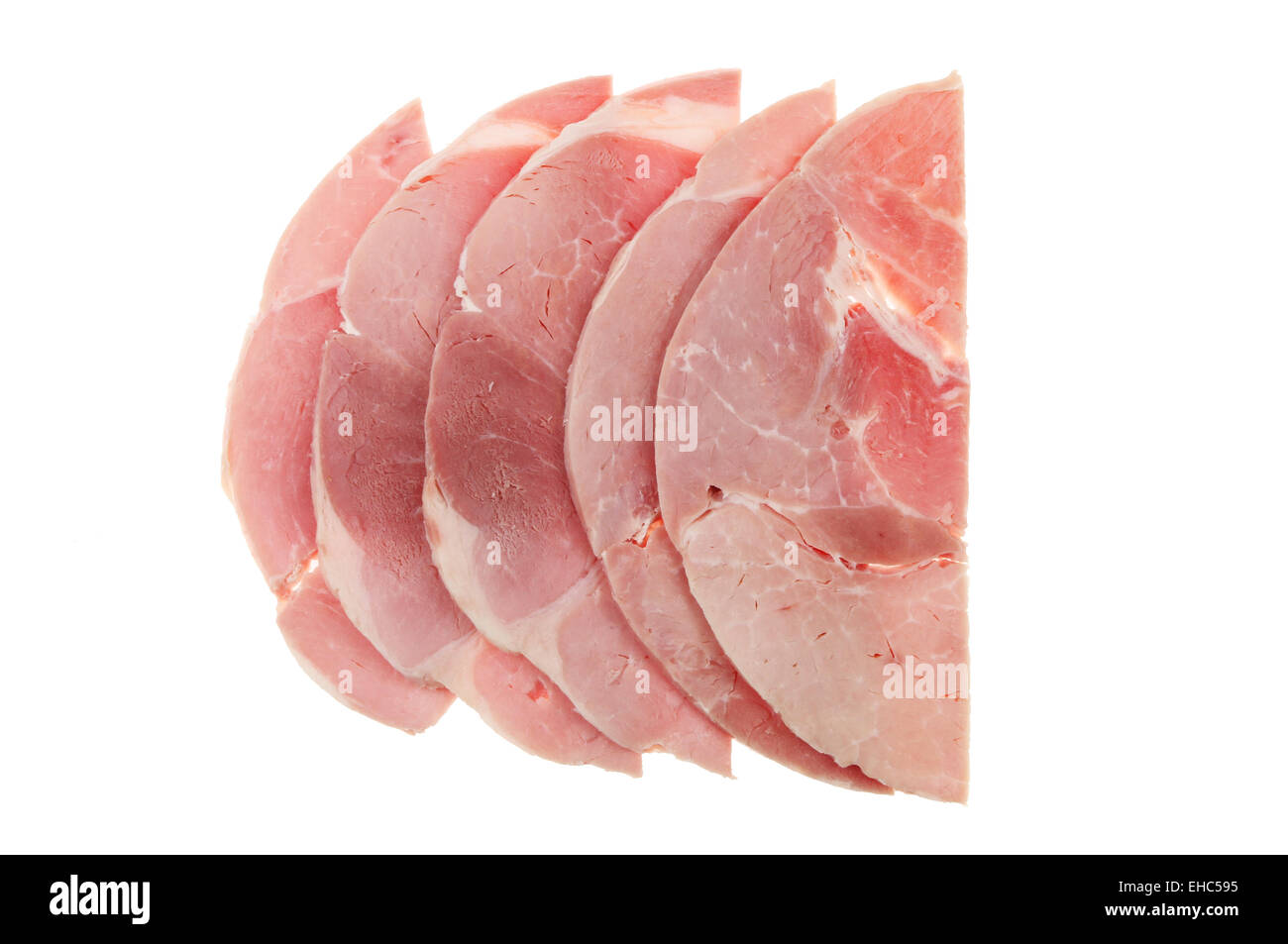 Fette di prosciutto isolata contro bianco Foto Stock