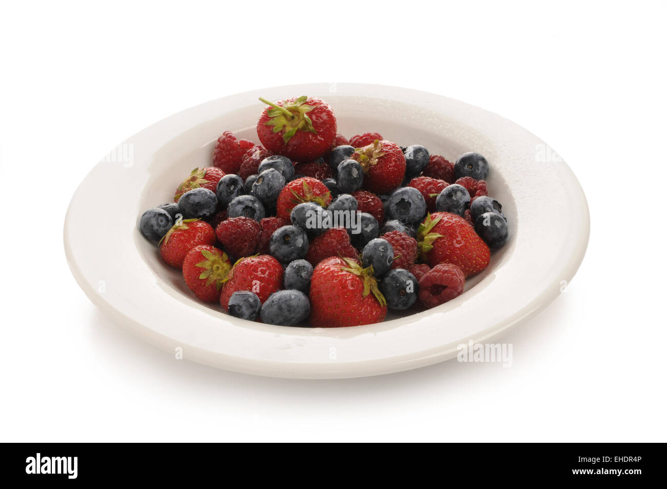 Berry miscela in una piastra bianca Foto Stock
