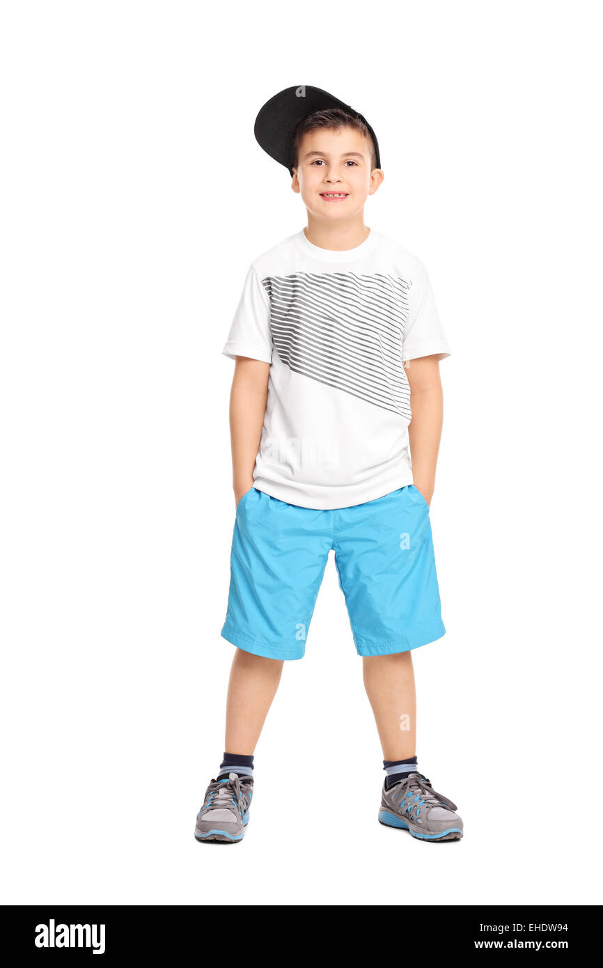 A piena lunghezza Ritratto di un fantastico piccolo ragazzo in abiti alla moda isolati su sfondo bianco Foto Stock