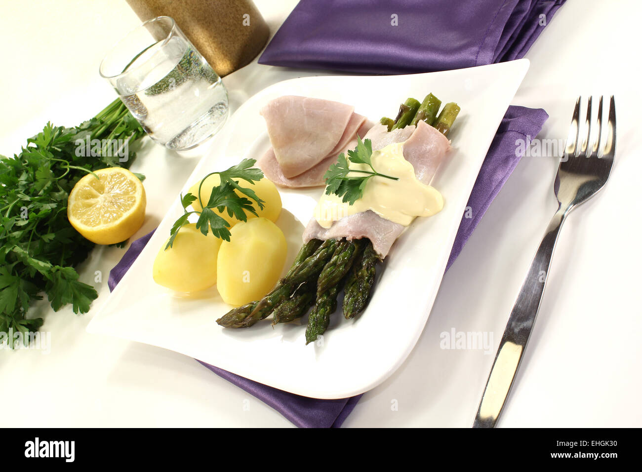 Asparagi con patate Foto Stock