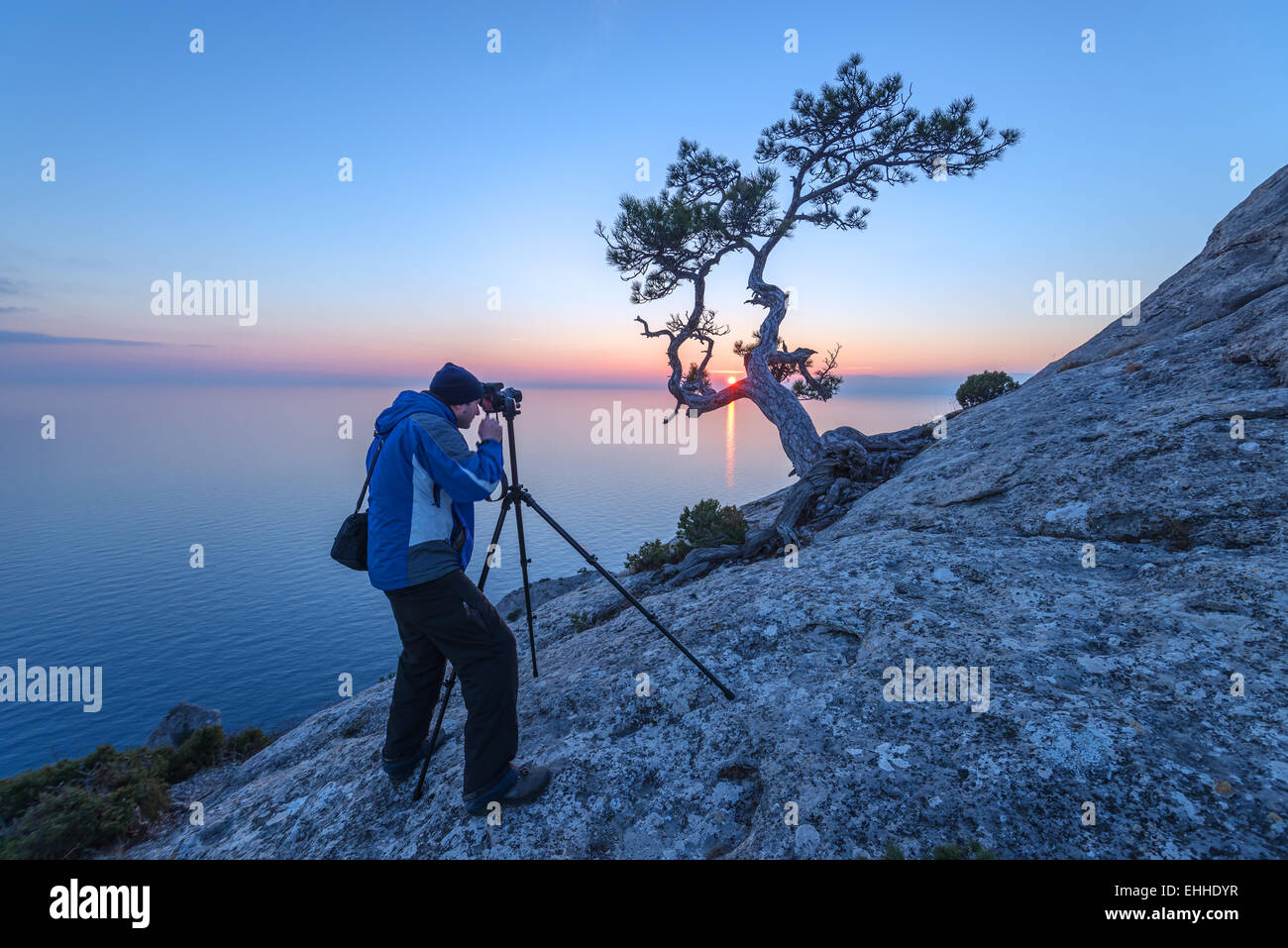 Fotografo in mattinata seascape Foto Stock