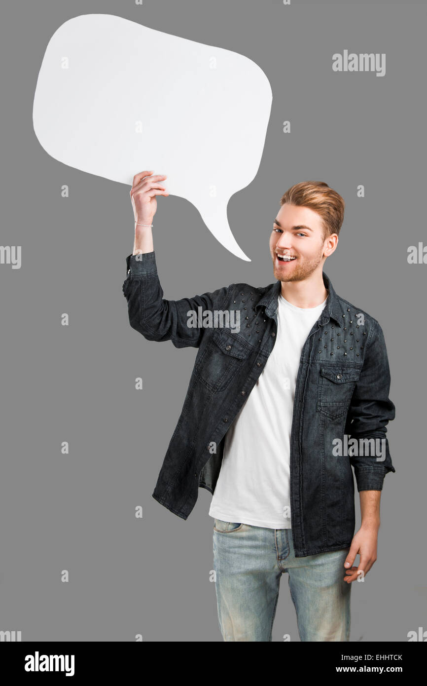 Buona ricerca giovane azienda e parlando con un palloncino speack Foto Stock