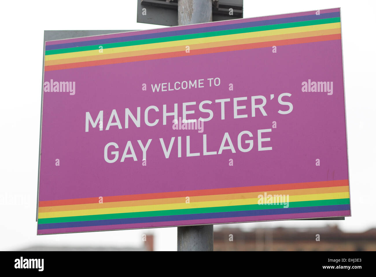 Benvenuti a Manchester il Villaggio Gay segno Foto Stock