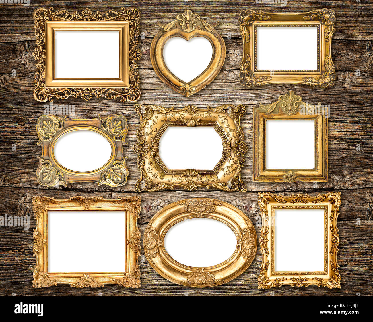 In stile barocco cornici dorate su legno rustico sfondo. Gli oggetti di  antiquariato Foto stock - Alamy