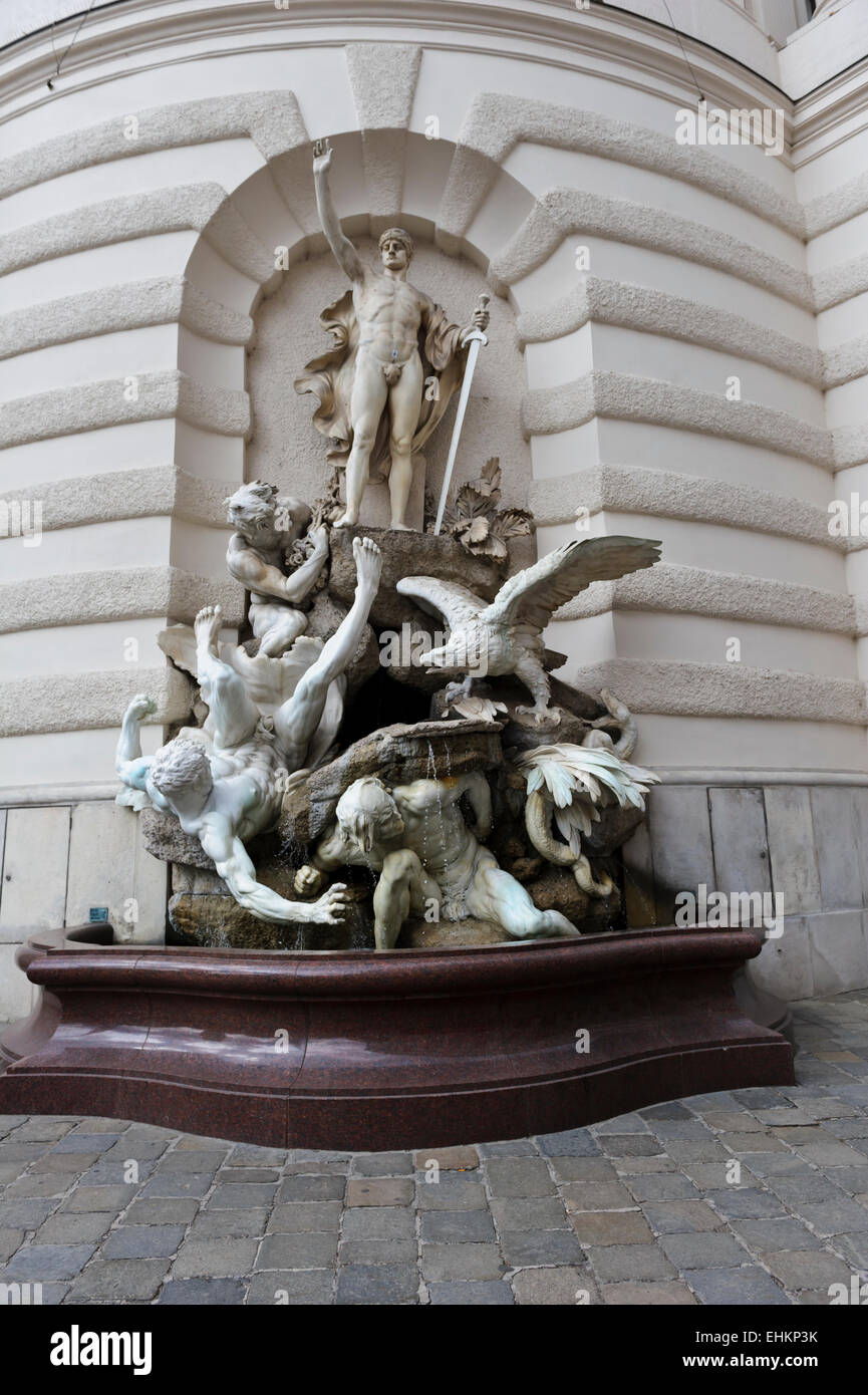 "Potere sulla terra' fontana da Edmund Hellmer nel 1897 come parte del Palazzo di Hofburg a Vienna, in Austria. Foto Stock