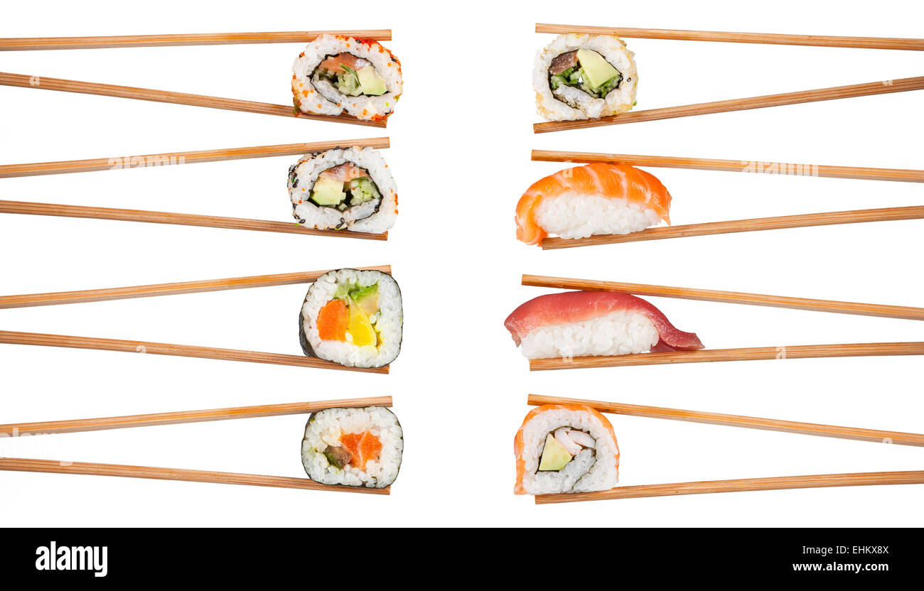 Delizioso sushi, maki e nigiri pezzi isolati su sfondo bianco Foto Stock