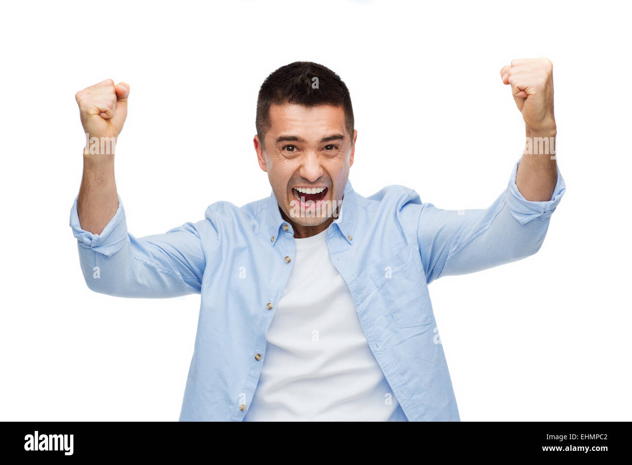 Happy laughing man con le mani alzate Foto Stock