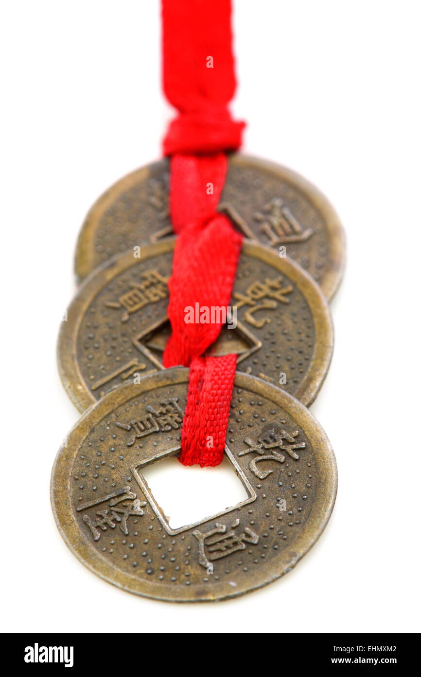 Tre monete cinesi. Foto Stock