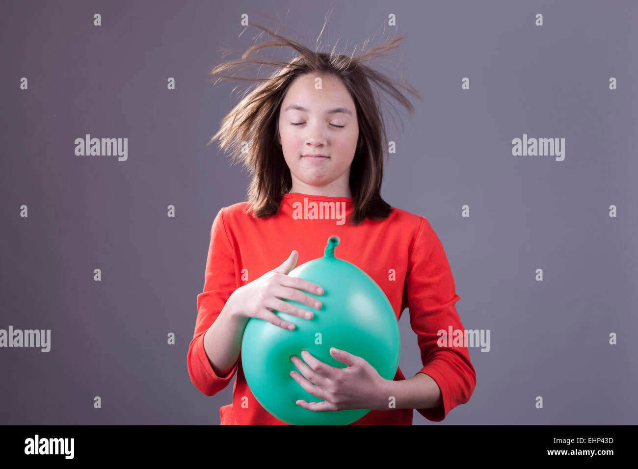 Capelli selvaggi da un palloncino blast. Foto Stock