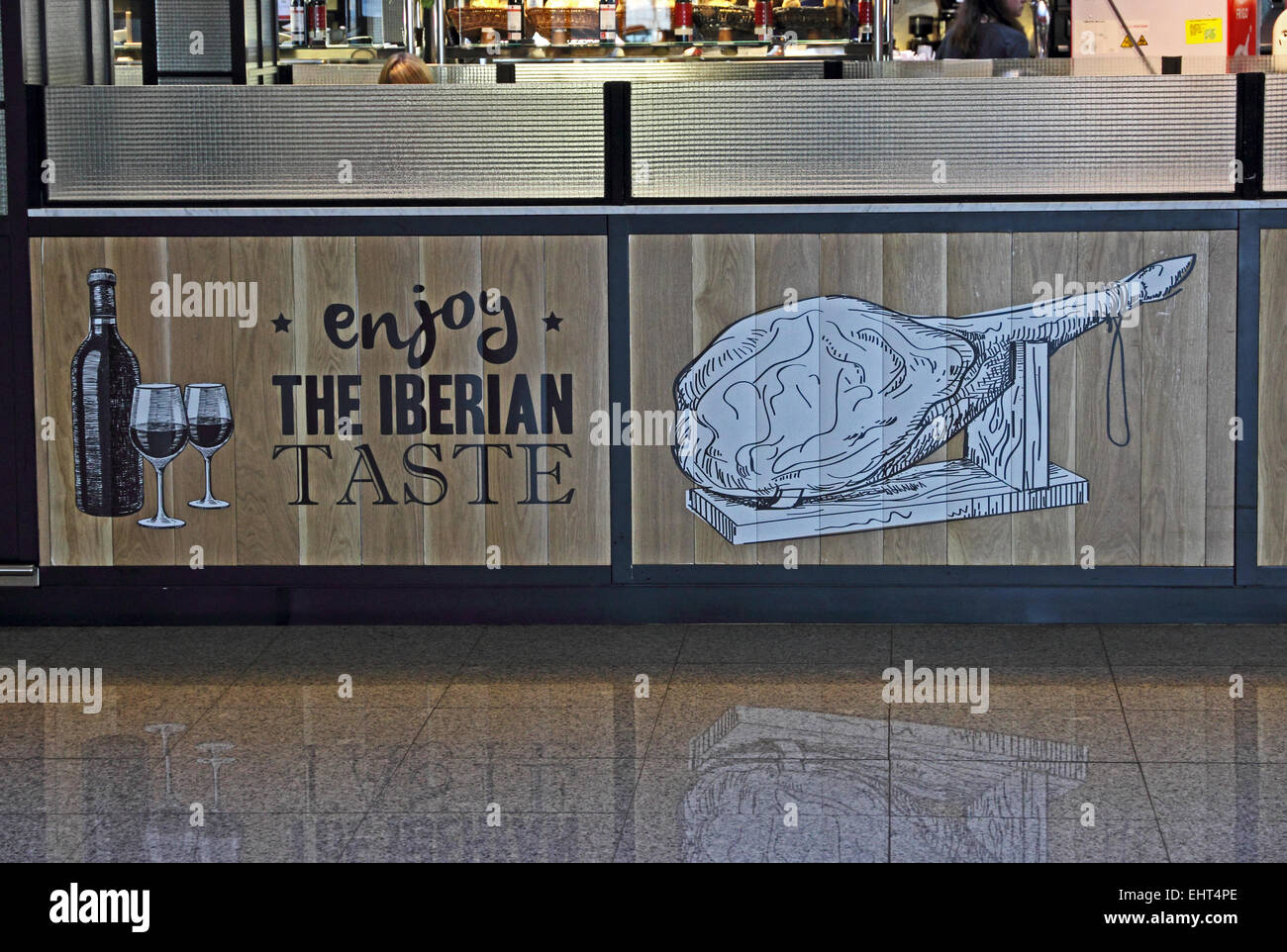 Godetevi il gusto iberico firmare fuori del ristorante all'aeroporto El Prat di Barcellona, Spagna Foto Stock