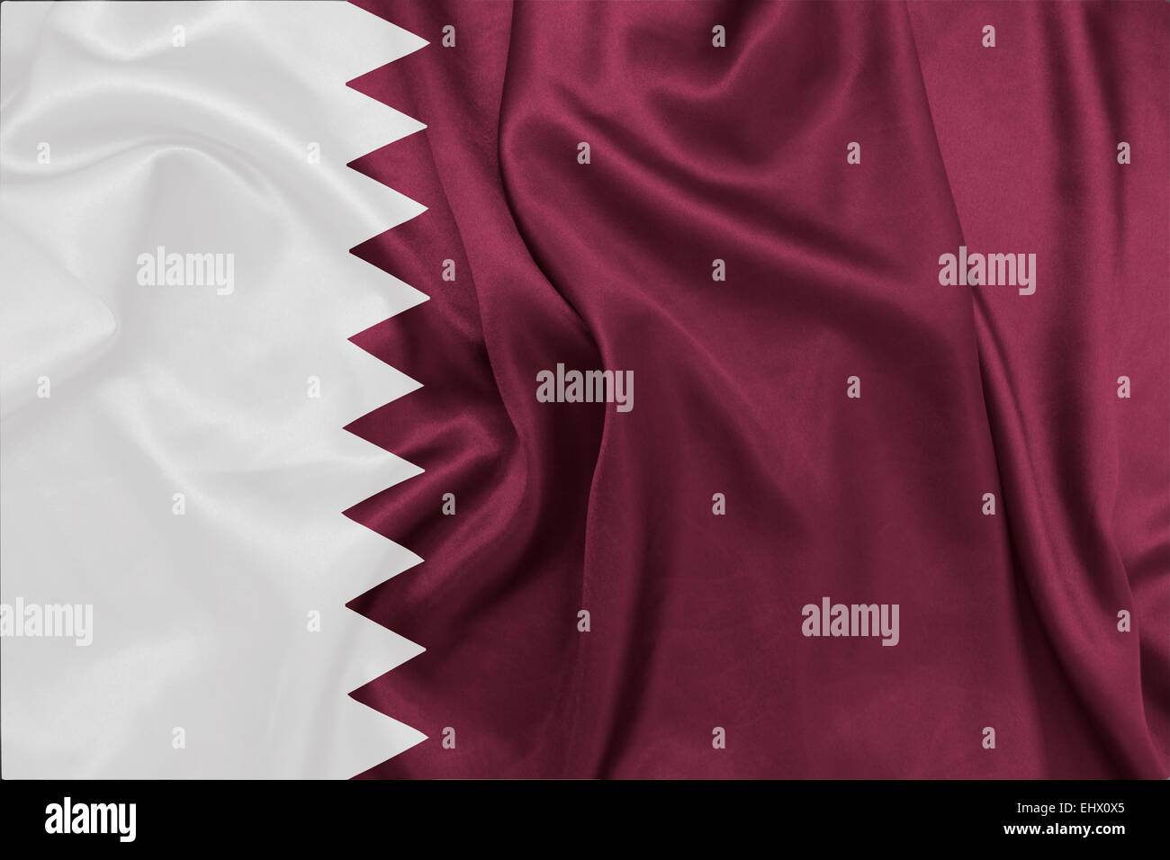 Qatar - sventola bandiera nazionale sulla tessitura della seta Foto Stock