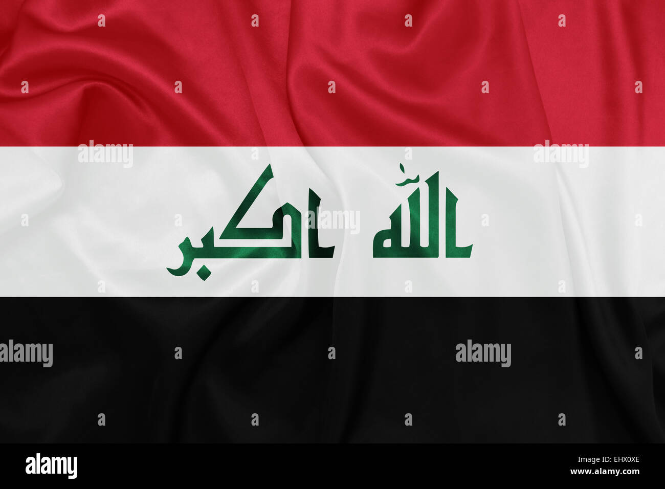 Iraq - sventola bandiera nazionale sulla tessitura della seta Foto Stock