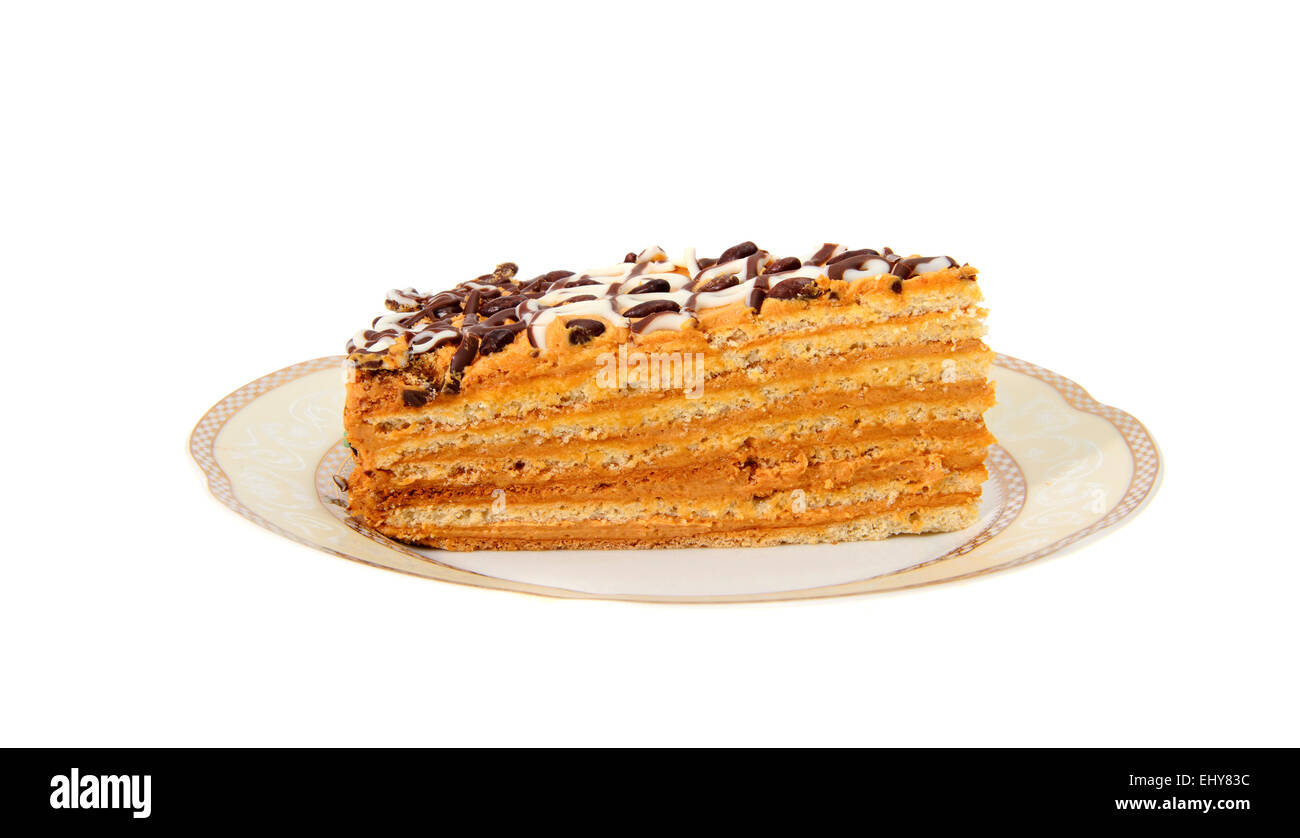 Dolce fetta di torta di miele. Isolato Foto Stock