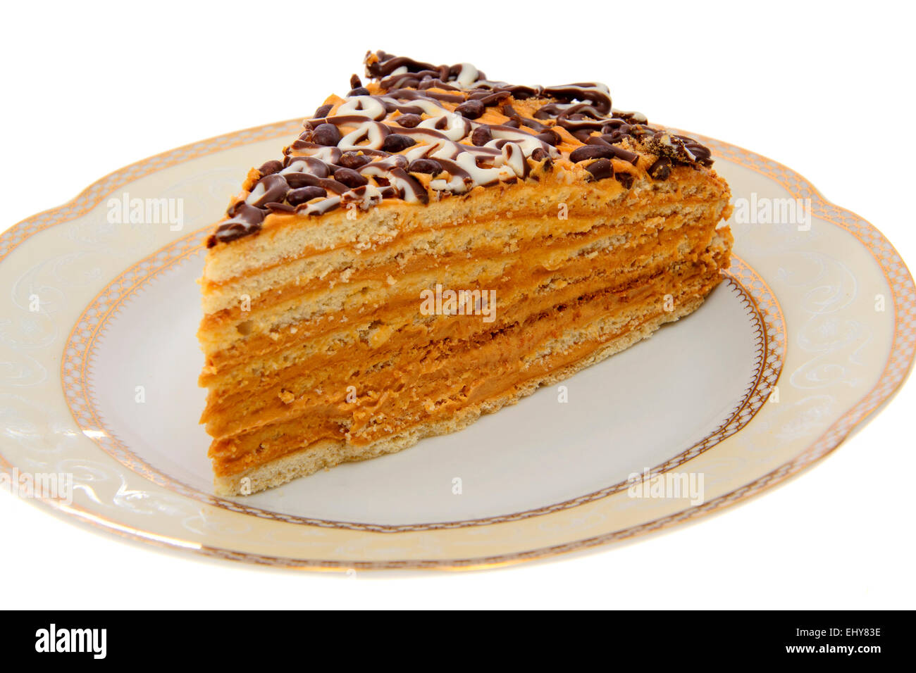 Dolce fetta di torta di miele. Isolato Foto Stock