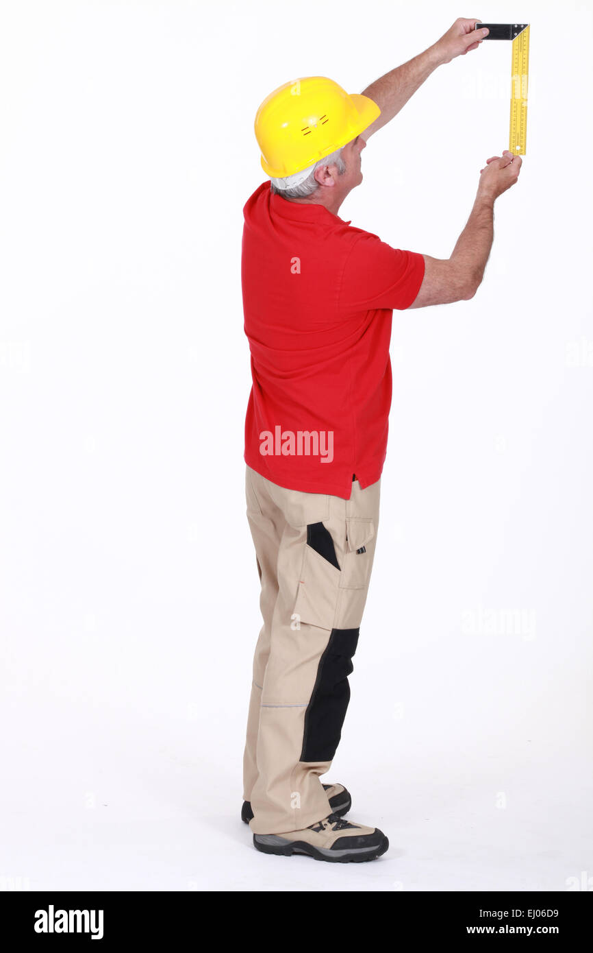 Carpenter misurazioni Foto Stock