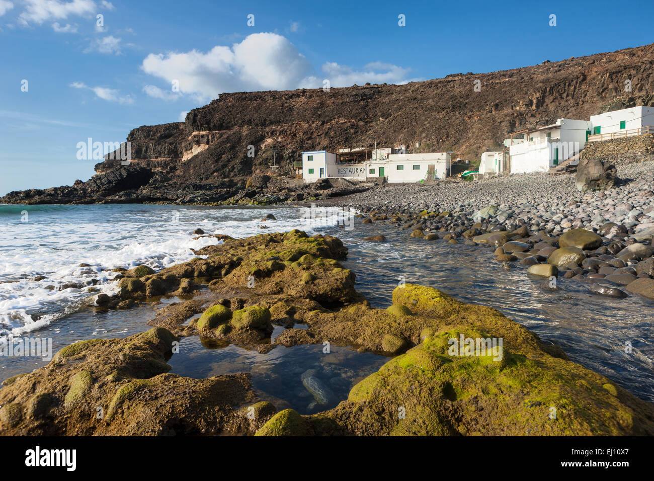 El Puertito de los Molinos, Spagna, Europa, isole canarie Fuerteventura, costa, case, case, ristorante, rock, Cliff, pietre Foto Stock