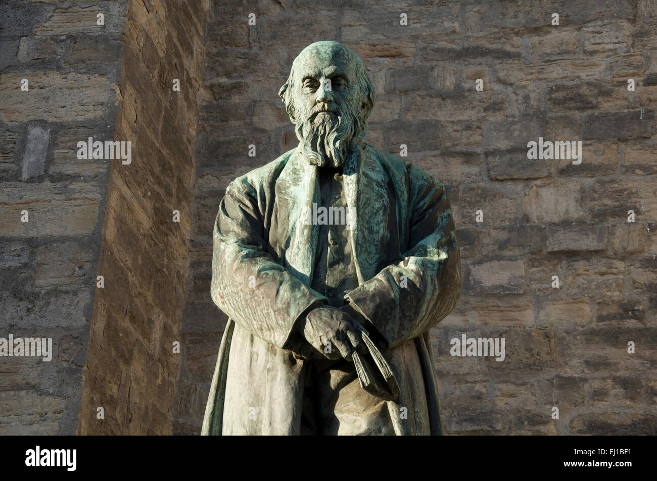 Letteratura inglese. Di sera il sole scende su una statua del poeta William Barnes, noto per la sua poesia nel dialetto di Dorset. Dorchester, Inghilterra. Regno Unito Foto Stock