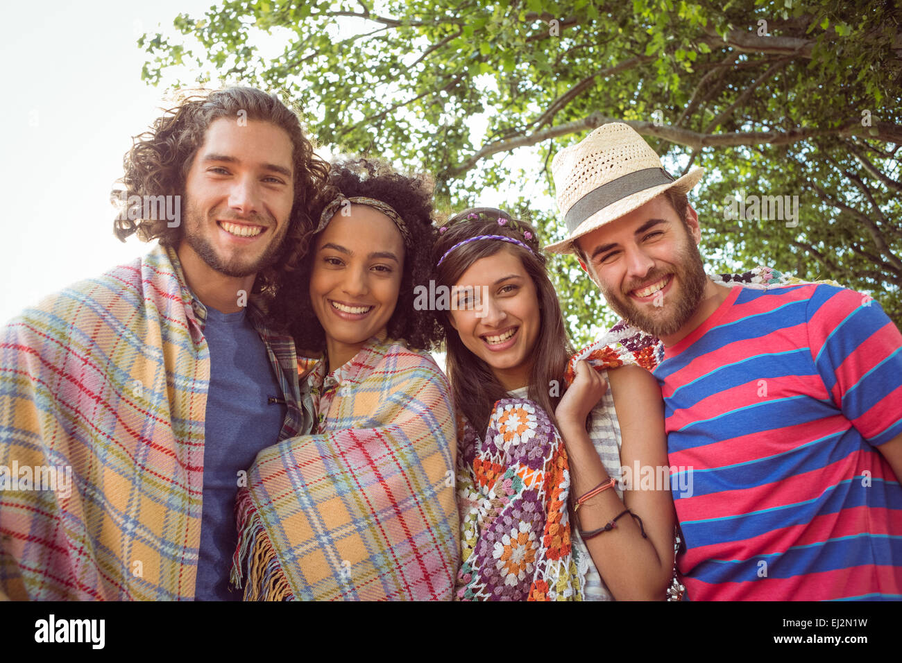Felice hipsters sorridente in telecamera Foto Stock