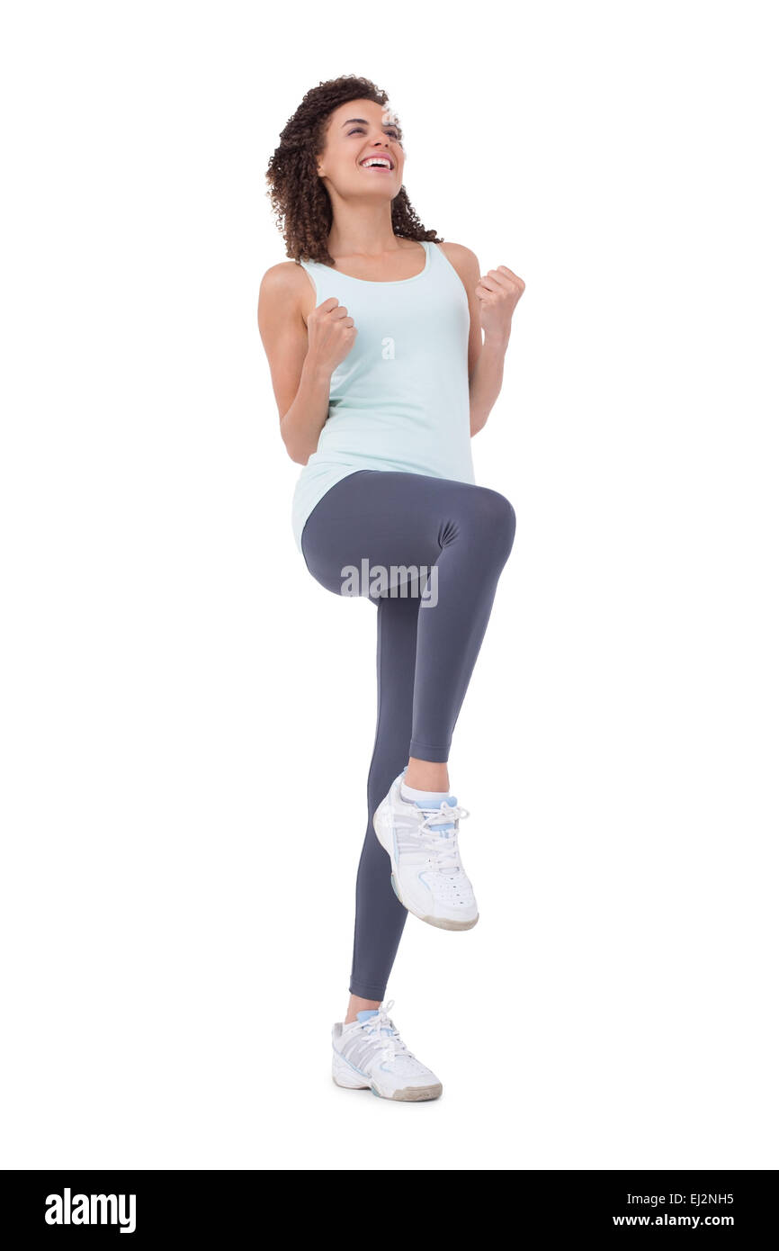 Montare la donna facendo esercizio aerobico Foto Stock
