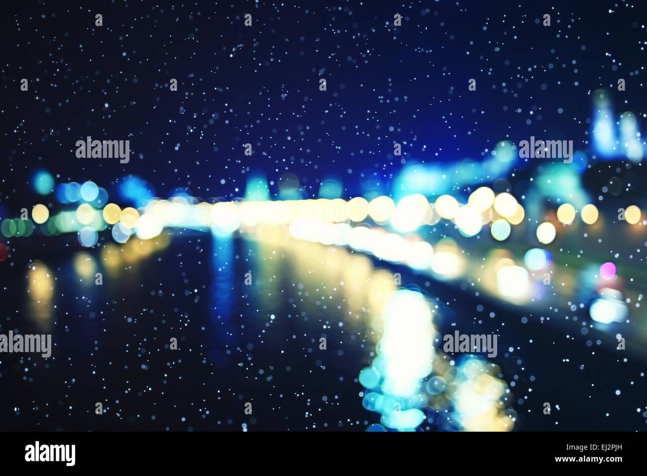 Sfocatura dello sfondo bokeh luci della città di notte Foto Stock