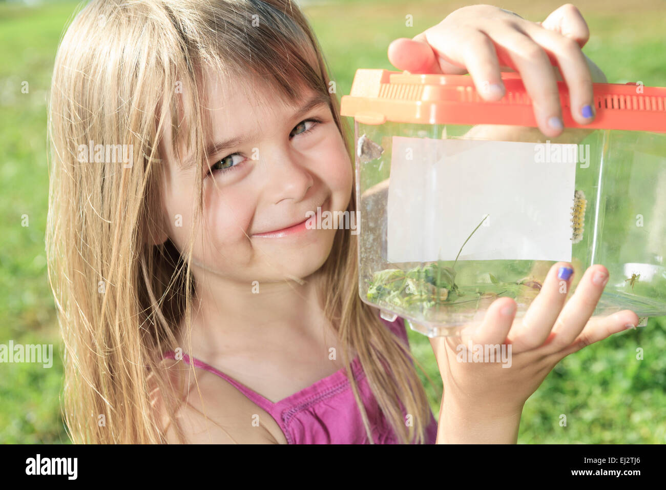 Bambina butterfly Foto Stock