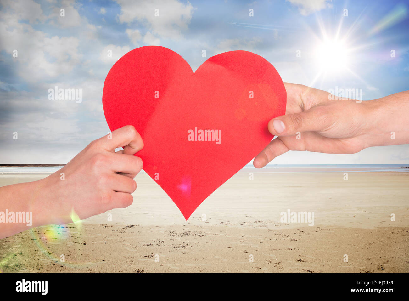 Immagine composita di mani cuore rosso Foto Stock