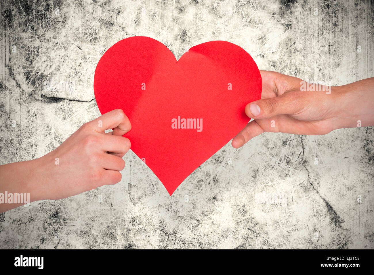 Immagine composita di mani cuore rosso Foto Stock
