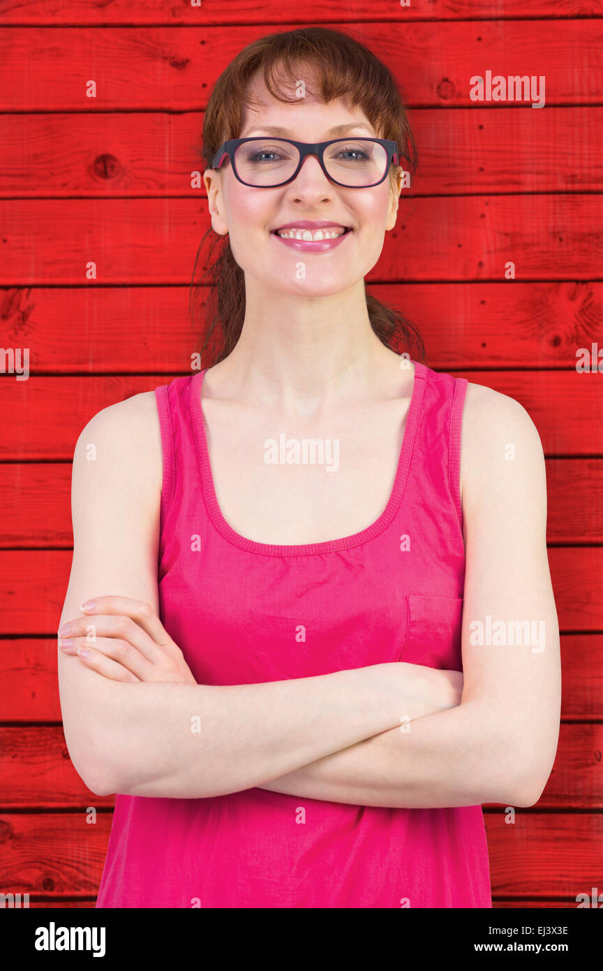 Immagine composita della donna con gli occhiali e sorridente Foto Stock