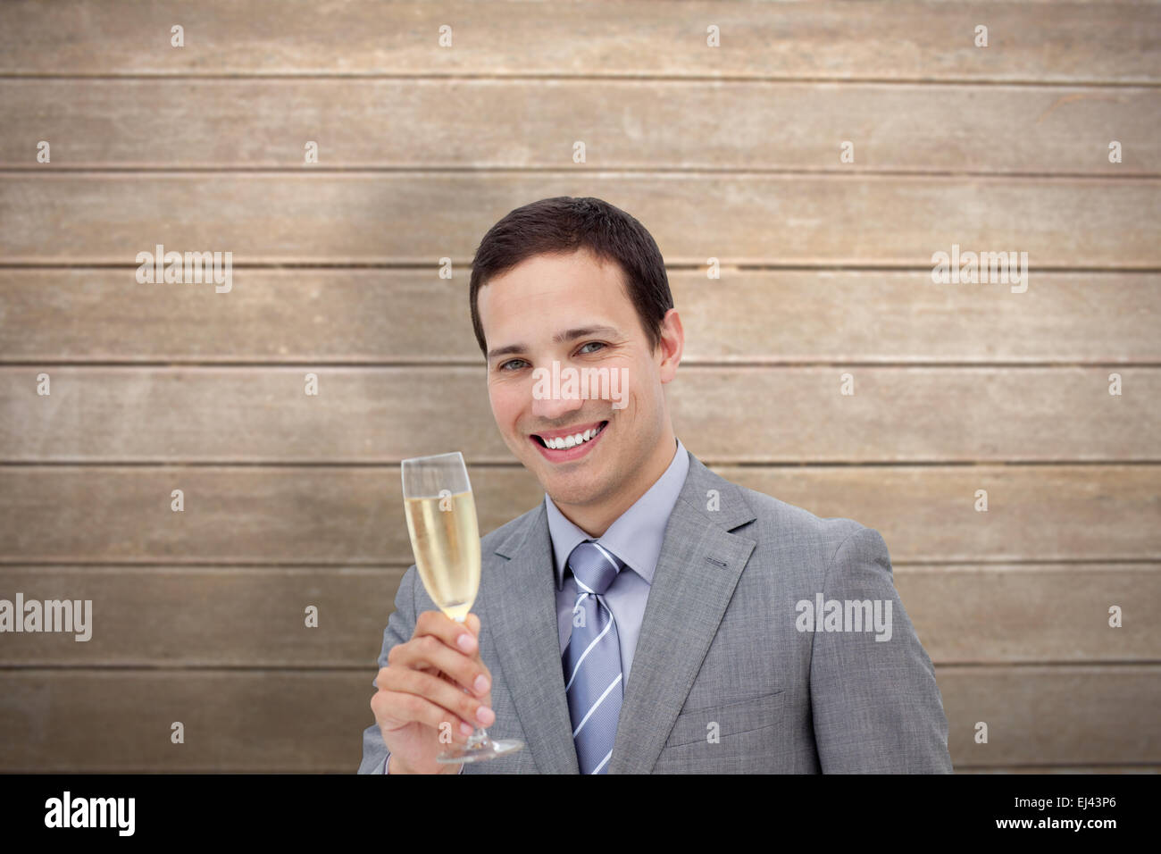 Immagine composita di imprenditore tostare con champagne Foto Stock