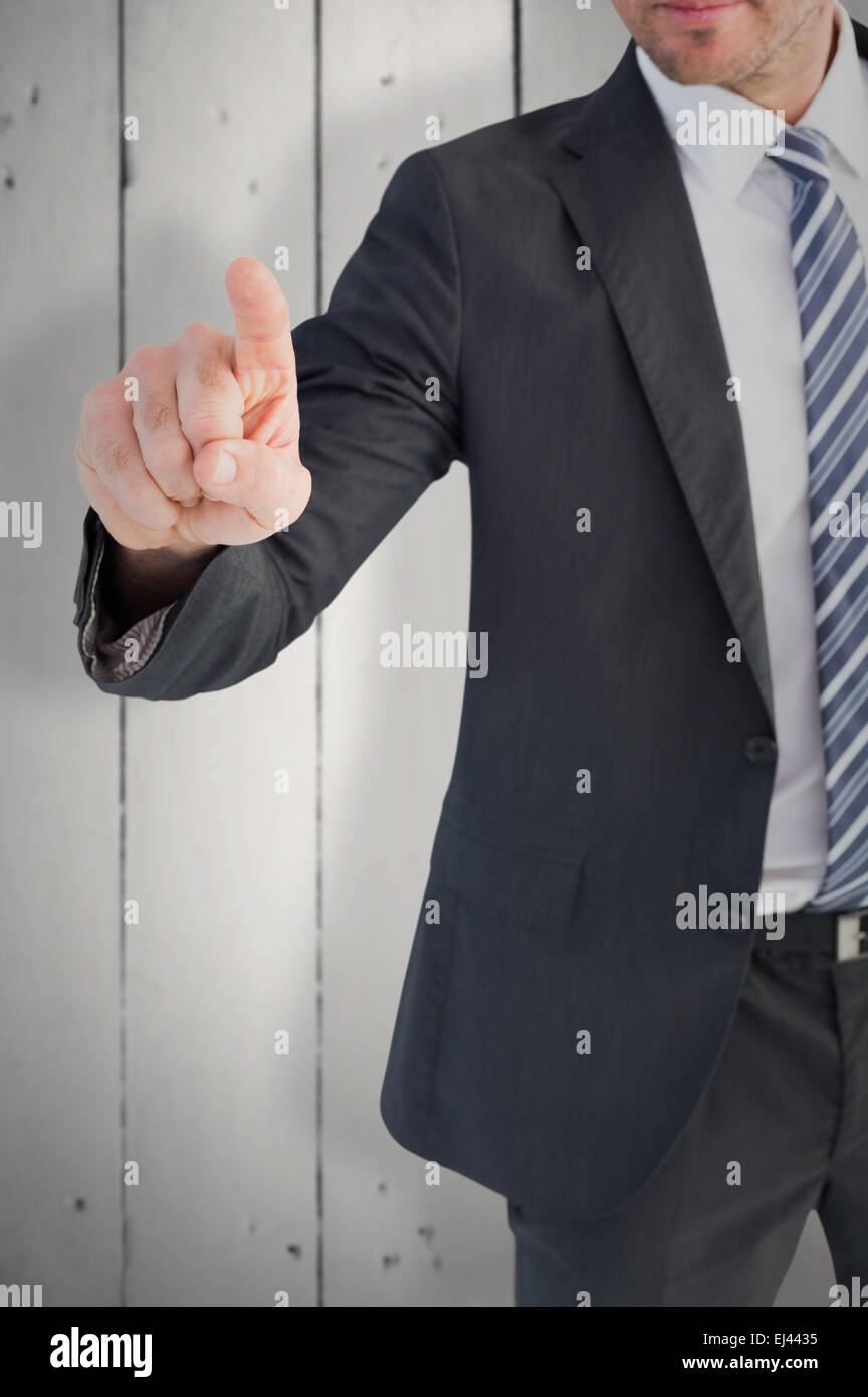 Immagine composita di imprenditore puntando con il suo dito Foto Stock