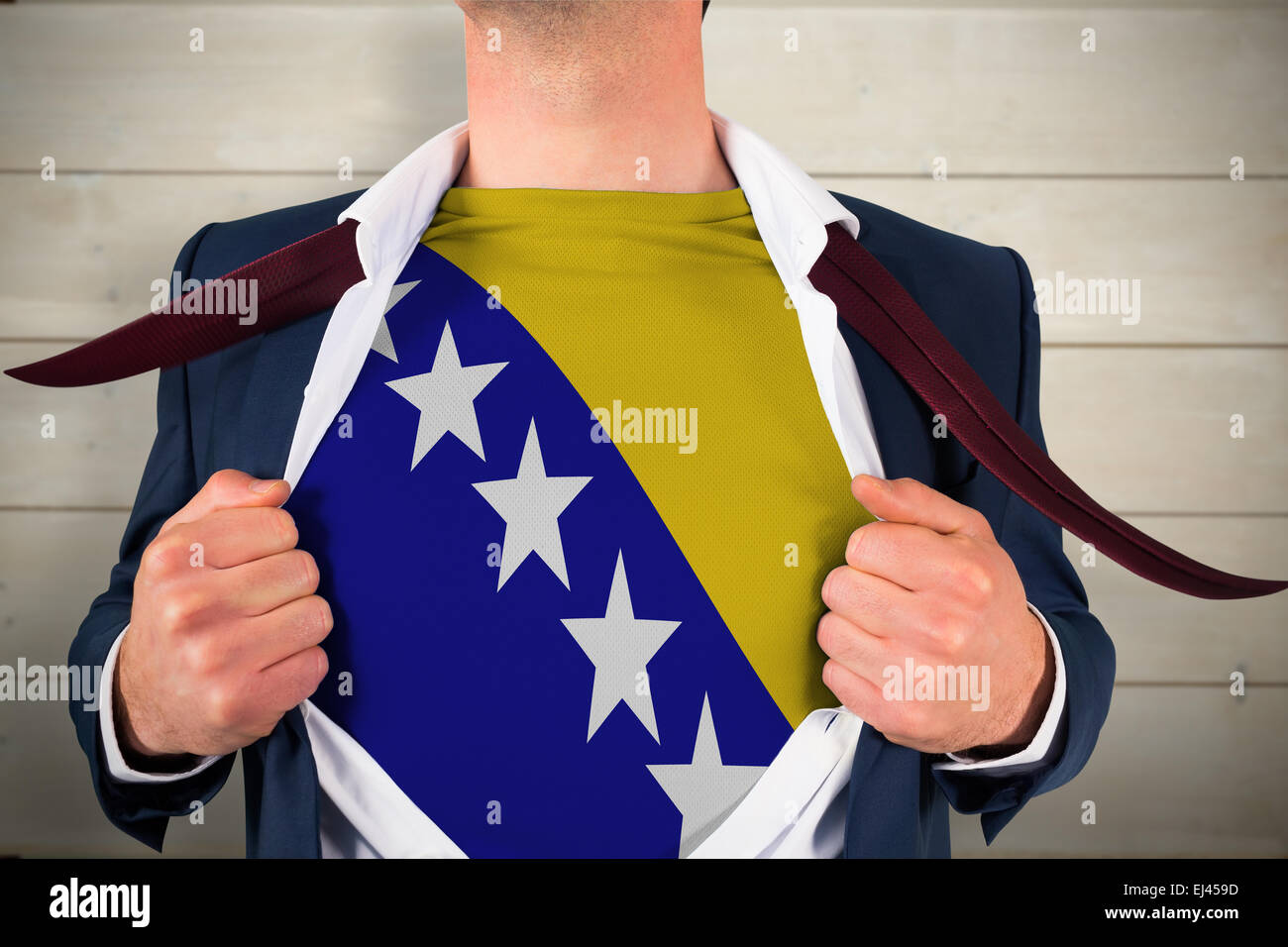 Immagine composita di imprenditore apertura camicia a rivelare la Bosnia bandiera Foto Stock