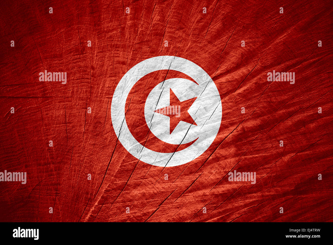 Bandiera della Tunisia o banner tunisino sulla texture in legno Foto Stock