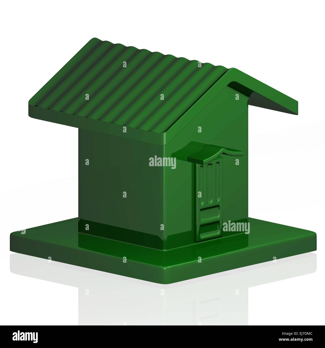 Verde Modello di plastica di una piccola casa Foto Stock