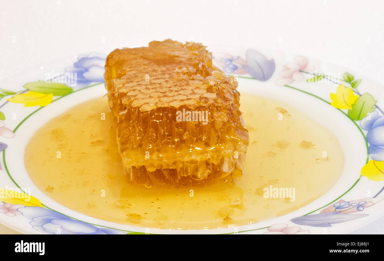 Fresca con miele di favo di miele . Foto Stock