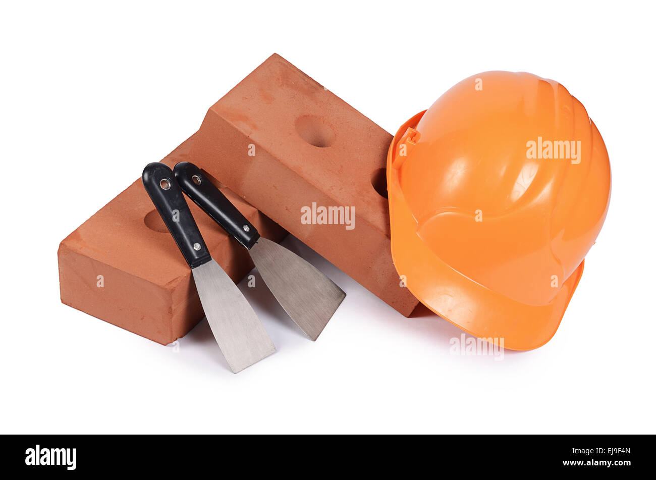 Mattone di Edificio con un casco Foto Stock