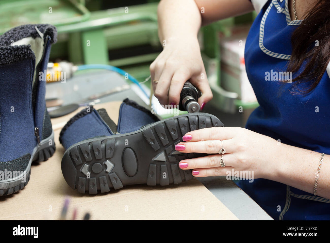 Immagine di trattamento dei lavoratori demi-stagione scarponi Foto Stock