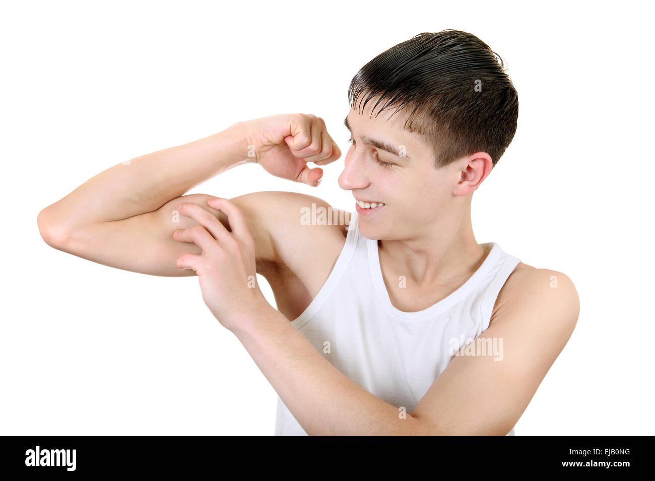 Adolescente flessione muscolare Foto Stock