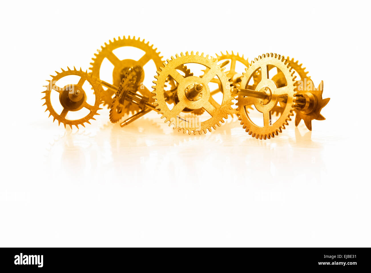 Una collezione di ingranaggio di orologio Foto Stock