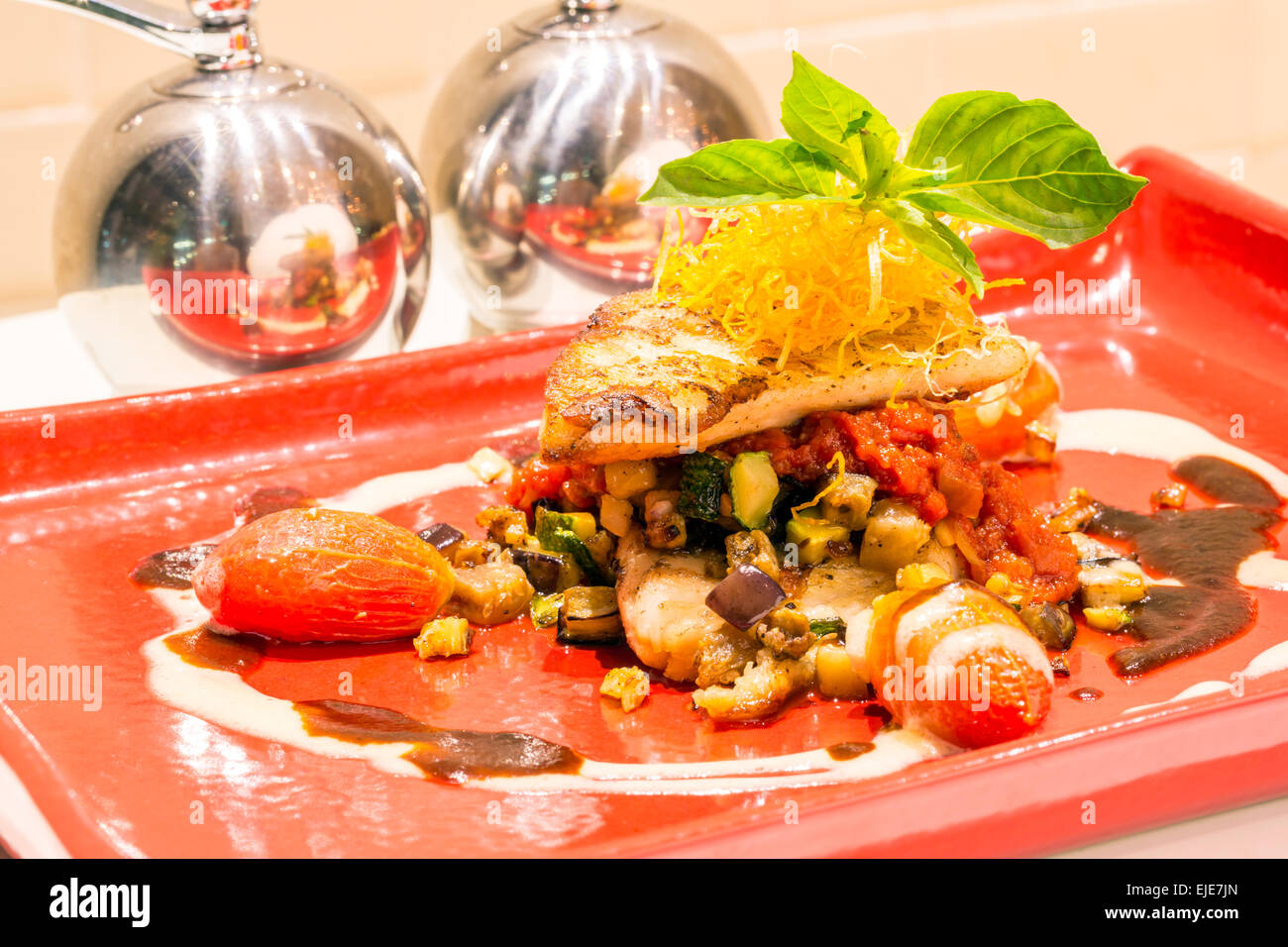 Spice grigliate di filetto di pesce pezzi Foto Stock