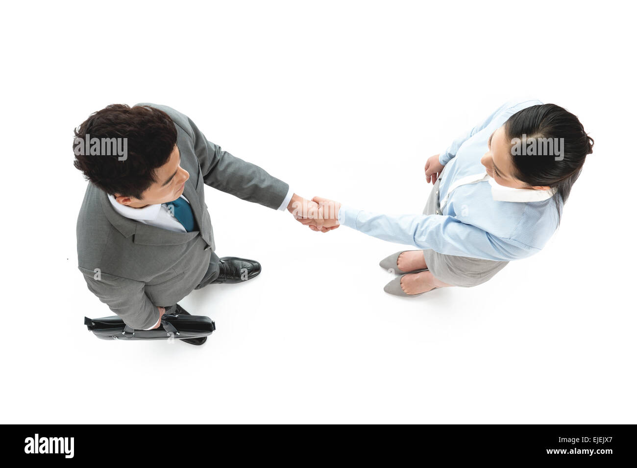 Attività di giovani uomini e donne agitare le mani Foto Stock