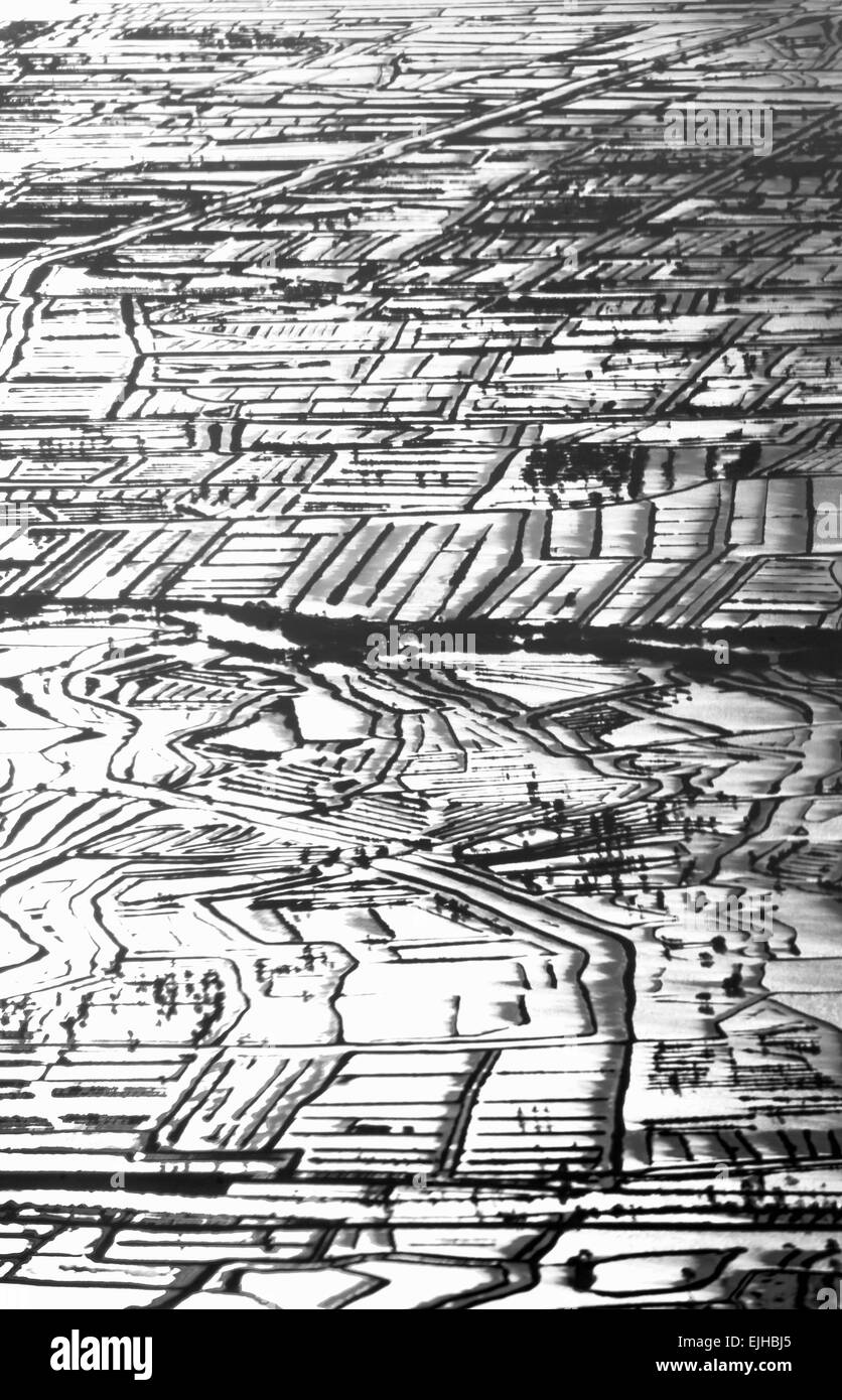 Vista aerea del risone lungo la costa al tramonto, isola di Giava, in Indonesia Foto Stock