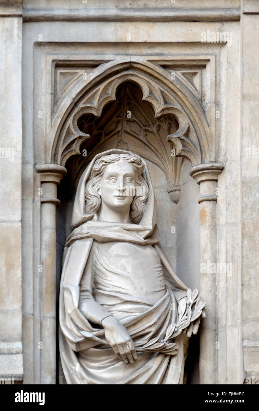 Londra, Inghilterra, Regno Unito. Statua di la porta occidentale di Westminster Abbey in rappresentanza di 'pace' Foto Stock
