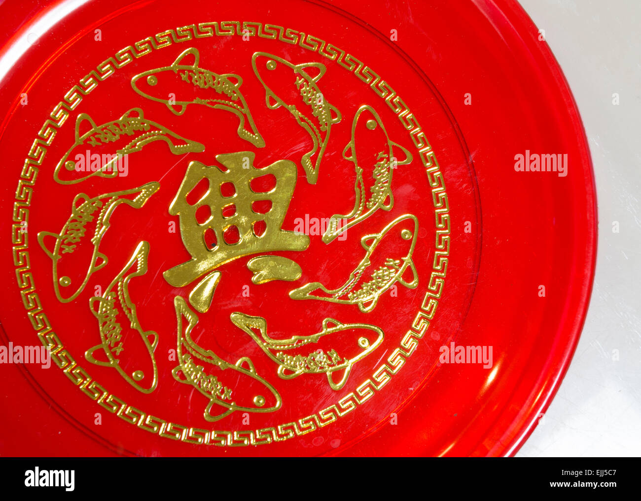 Piastra red scrittura cinese rivestimento in oro Foto Stock