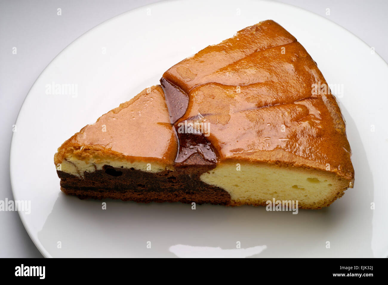 Cioccolato e vaniglia tart slice closeup Foto Stock