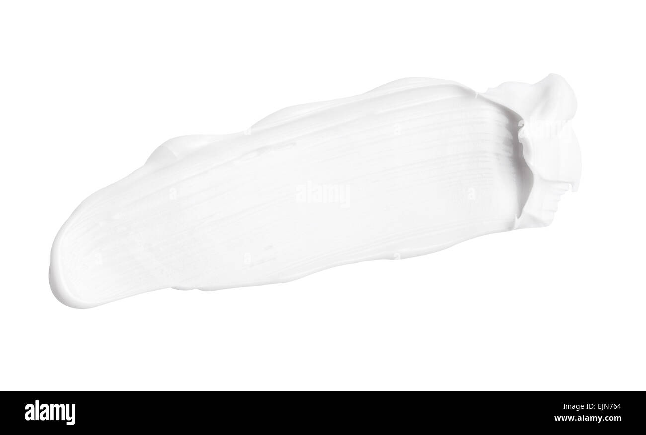In prossimità di un tratto di un bianco crema di bellezza su sfondo bianco con tracciato di ritaglio Foto Stock