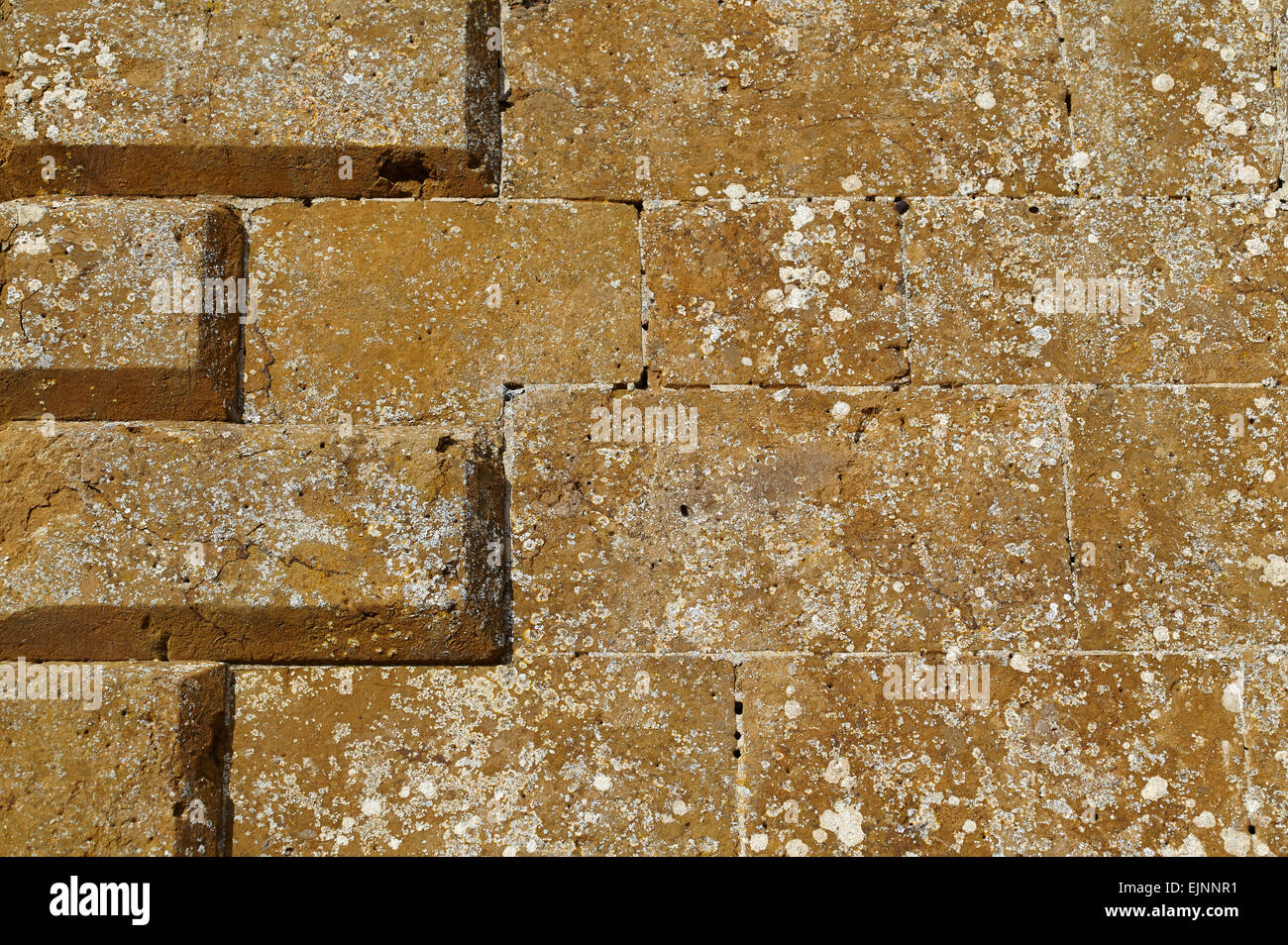 Muro di pietra con dettaglio di bordo Foto Stock