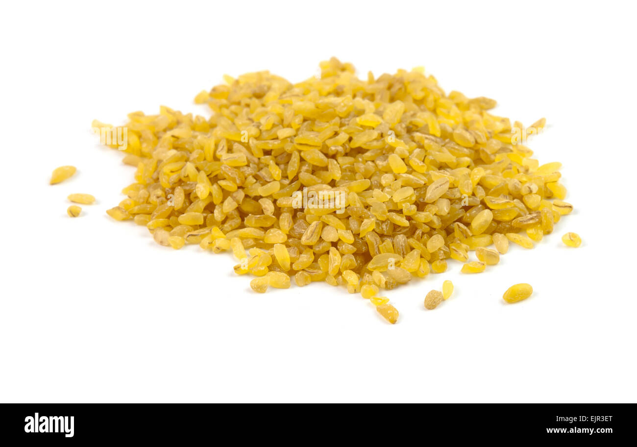 Golden rice mucchio isolati su sfondo bianco Foto Stock